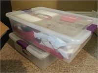 2 totes loade with tissue paper, linens decor