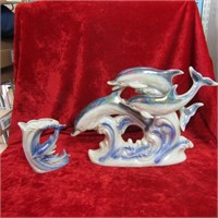 (2) Dolphin figurines.