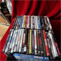 (43) DVD in cases. Action and family movies.