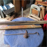 Antique fence stretcher, engine wood stand