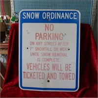 Vintage Snow Ordinance Street sign.