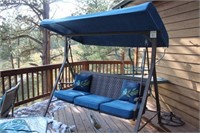 Porch Swing with Attached Canopy