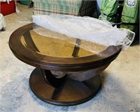 Nice Round Coffee Table on Wheels, Amber glass,