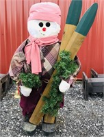 Wooden snowman with skis & bell