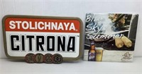 * (2) different alcohol advertising tin signs w/