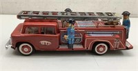 Tin litho fire truck. Working. Push bumper and