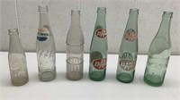 * (6) vtg printed label soda bottles