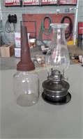 Jar with oil spout znd modern kerosene lamp