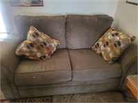 Brown Fabric Loveseat W/ Pillows
