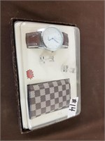 package set of a watch, wallet, and cufflinks