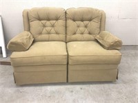 Tan Upholstered Double-Reclining Love Seat