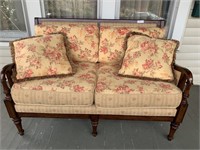 Settee upholstered with mahogany finished frame