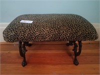 Cast iron stool upholstered in animal pattern
