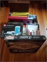 Box of board games including Scrabble, The