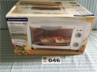 DURABRAND 4 SLICE TOASTER OVEN. NEW IN BOX