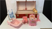 Vintage baby doll toy collection in case