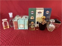 Box of perfumes and cologne (some used) including