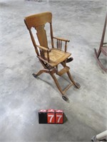 WOOD HIGH CHAIR ON WHEELS- CANED SEAT