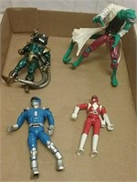 Four Action Figures Including Power Rangers