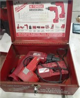 Metal tool box with drill driver