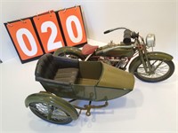 large early Harley Davidson model with side car