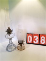2 glass oil lamps one tall one short