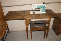 SINGER SEWING MACHING AND CABINET