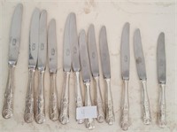 814 - LOT OF 12 STAINLESS TABLE KNIVES (4)