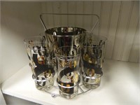 SET OF 8 BLACK AND GOLD GLASSES & AN ICE BUCKET