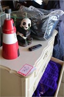 dresser, Afghans, sleeping bag, Panda statue