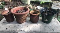 4 small assorted planters