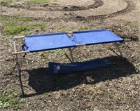 Folding cot with bag. Never used.