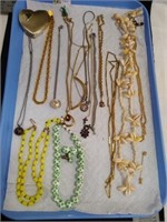Glass beaded necklace lot and compact