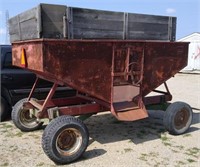 Gravity wagon with left hand dump with