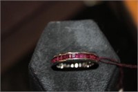 14k white gold Ruby Eternity Band featuring