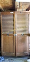 Metal storage cabinet with louvered doors