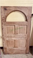 3/4 solid oak door with an arched eyebrow window,