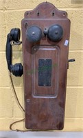 Antique mahogany crank wall phone, with the