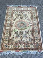 Vintage wall carpet, with title fringe, pink and