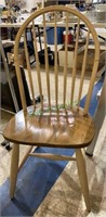 One oak kitchen chair, with a saddle seat,