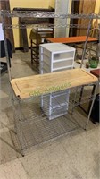 Metal wire pantry kitchen shelf unit, with a wood