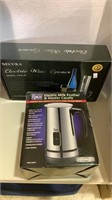 Electric wine opener in the box with an electric