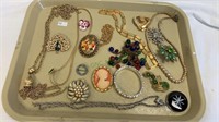 Tray lot of costume jewelry, including a cameo