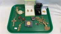 Tray lot of religious jewelry, Girl Scout pins,