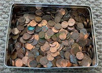Tin box filled with pennies several hundred US