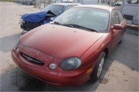 1999 Red Ford Taurus