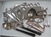 silver plate flatware and tongs