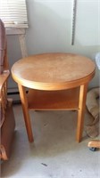 Mid century round wood table