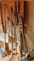 Group of shovels and other lawn and garden tools