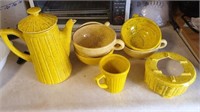 Yellow dish set, couple bowls are cracked